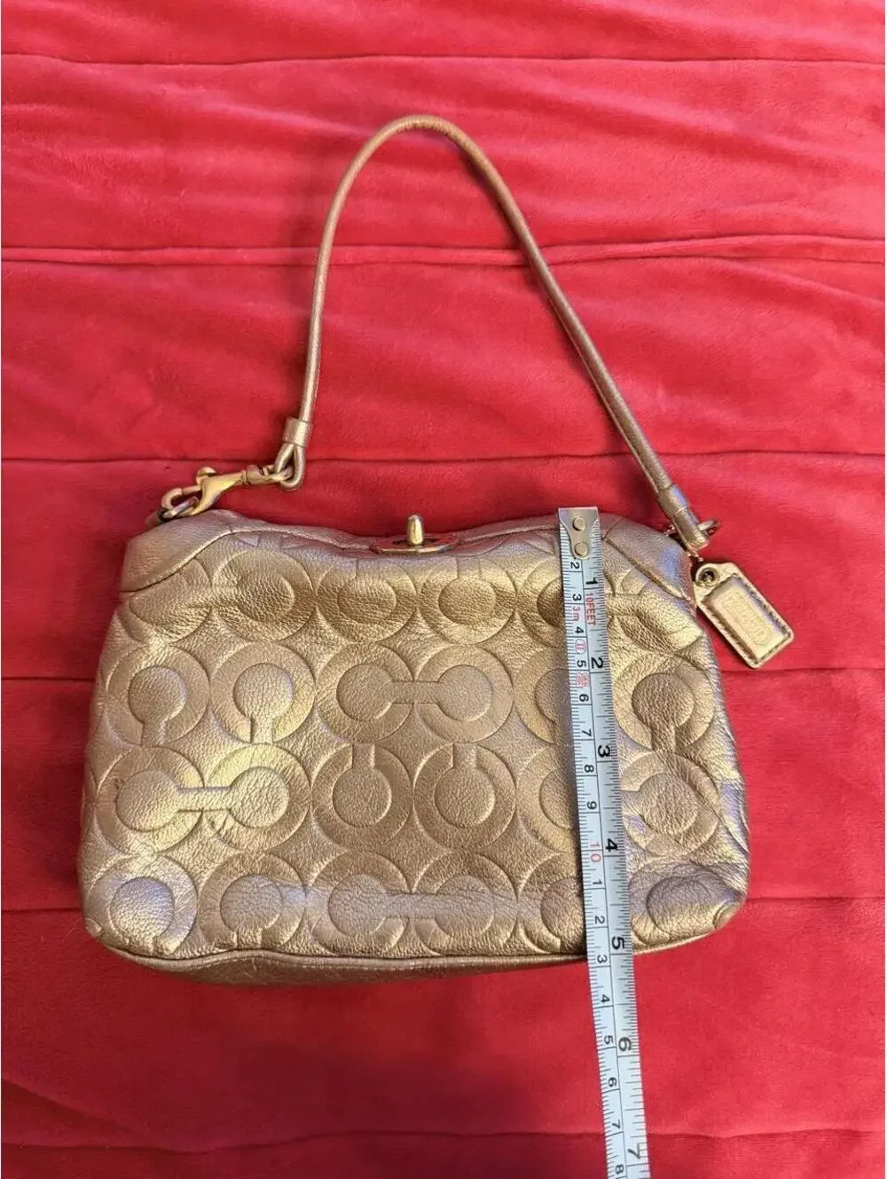 Vintage Rose Gold Coach Turnlock Wristlet